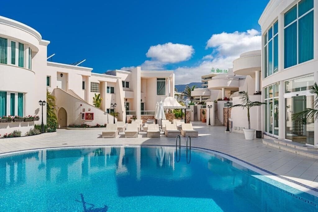 Фото Flamingo Suites 4*