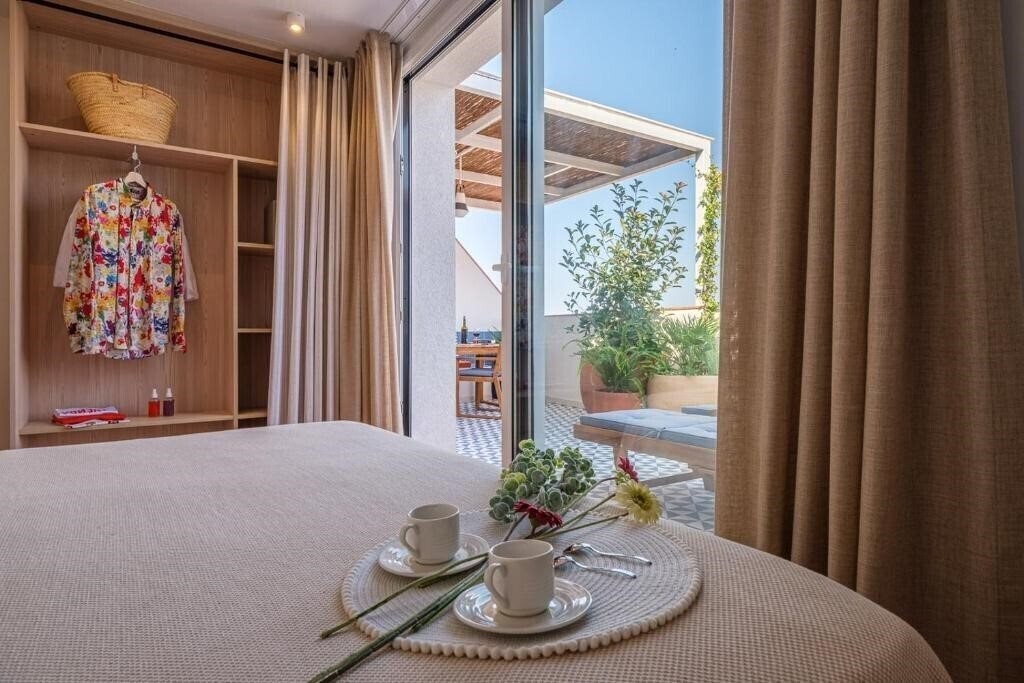 Фото Les Dalies Apartments апартаменты