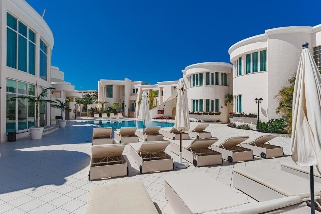 Zdjęcie Flamingo Suites 4*