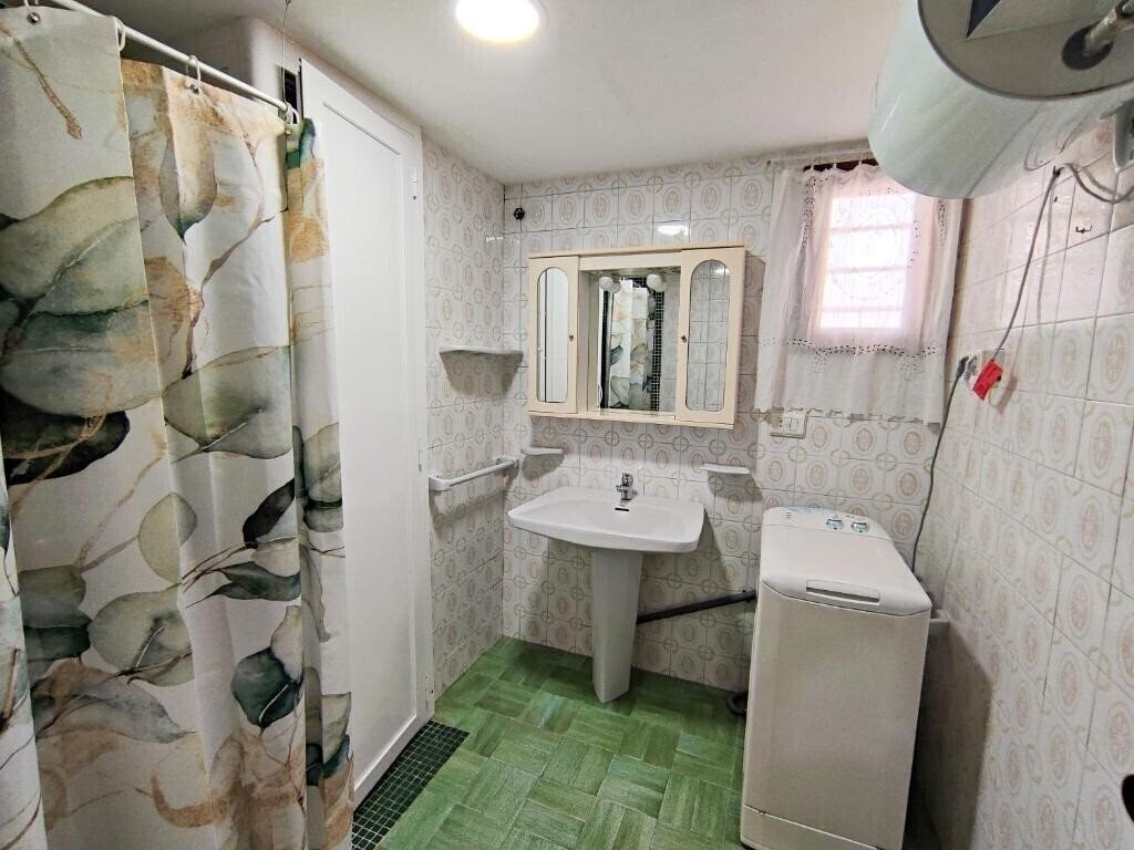 Фотографія Apartamentos Gandia Primera Linea De Playa 3000 3*