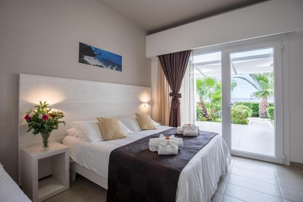 Zdjęcia Villaggio Baia D'Ercole 4*