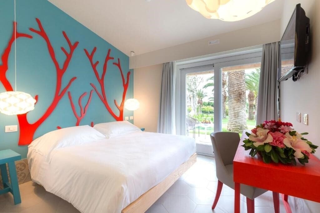 Zdjęcie Villaggio Club Baia Del Sole 4*