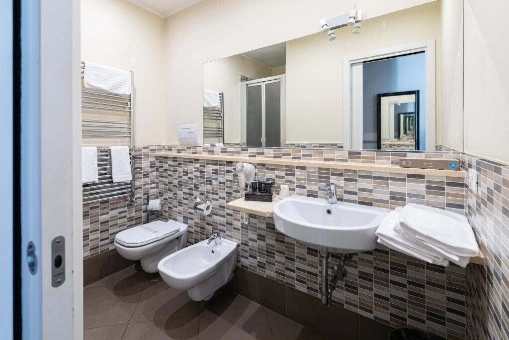 Фотографія Hotel Ambasciatori Palermo 4*