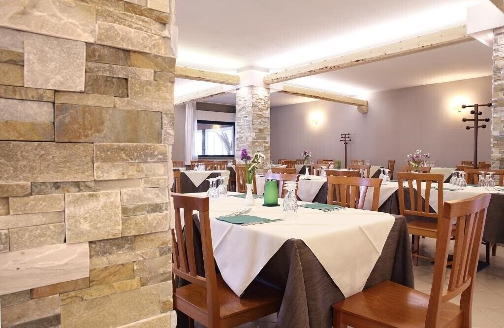 Obraz Hotel Pausania Inn 3*