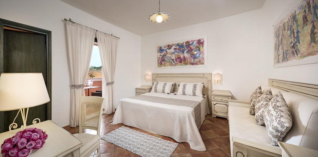 Zdjęcie I Giardini Di Cala Ginepro 4*