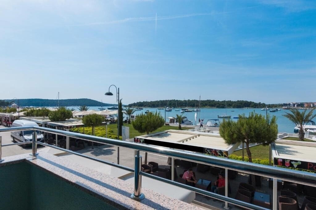 Фотографія Riva Apartment апартаменты