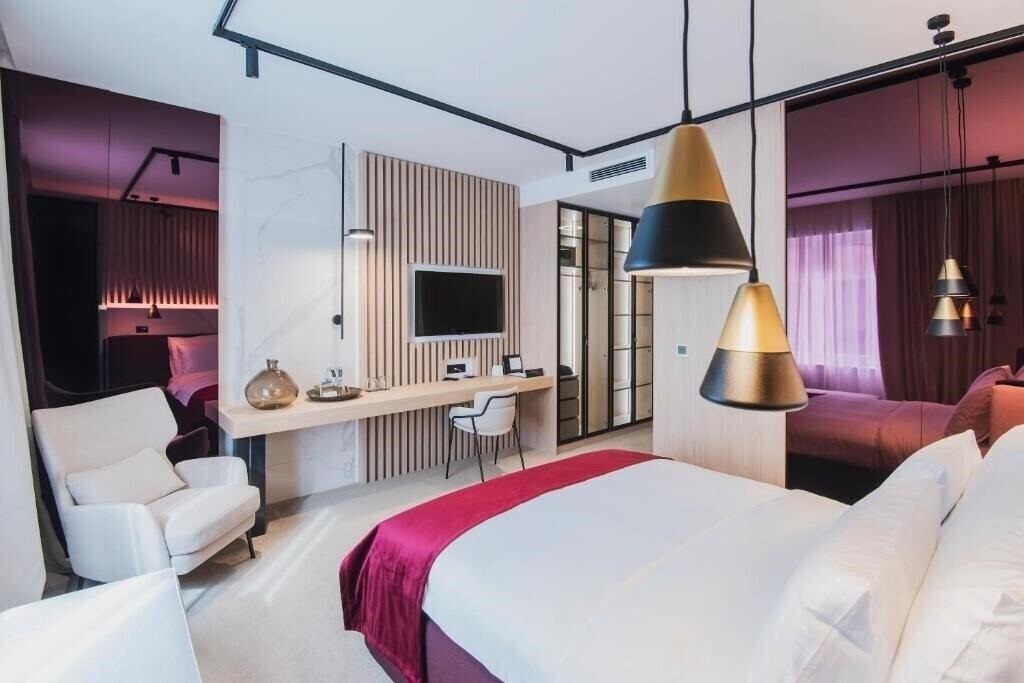 Фотографія Pod Zidom Rooms 4*