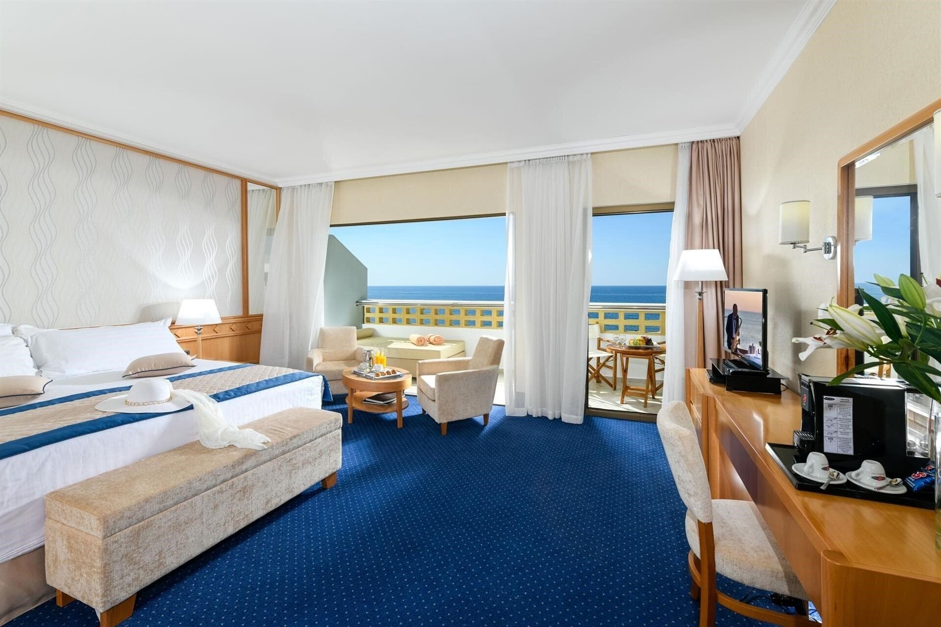 Zdjęcie Constantinou Bros Pioneer Beach Hotel 4*