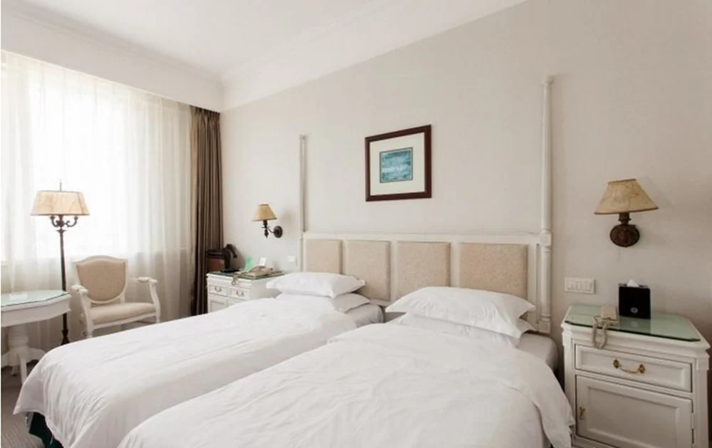 Фотографія Golden Coast Lawton Hotel 5*