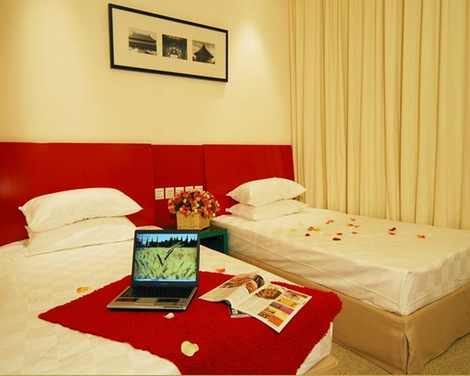 Изображение Traveler Inn Huaqiao Beijing 3*