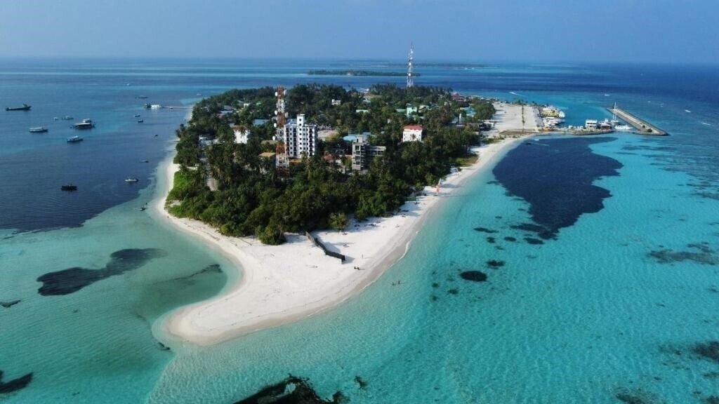 Фотографія Manta Dhangethi Guest House коттедж