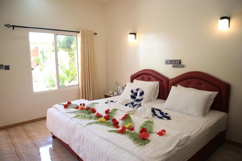 Zdjęcia Evila Inn Thoddoo 1*