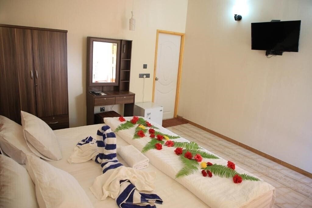 Obraz Evila Inn Thoddoo 1*