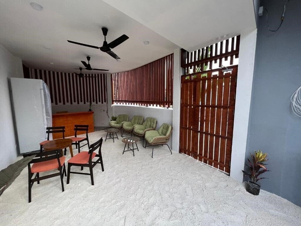 Zdjęcie Finolhu Inn Dhigurah Guest House гостиный двор