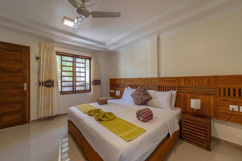 Zdjęcia Kamadhoo Inn Guest House гостиный двор