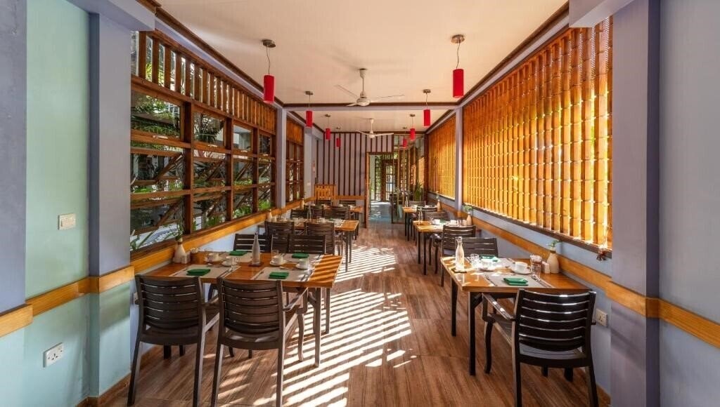 Obraz Kamadhoo Inn Guest House гостиный двор