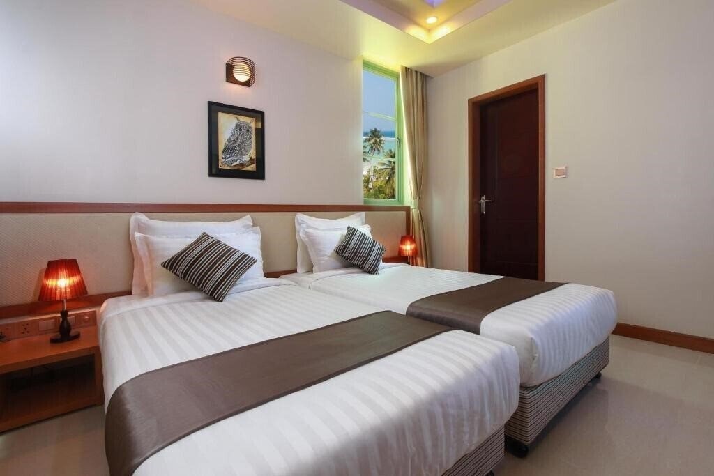 Zdjęcia Season Holidays Hulhumale Guest House гостиный двор
