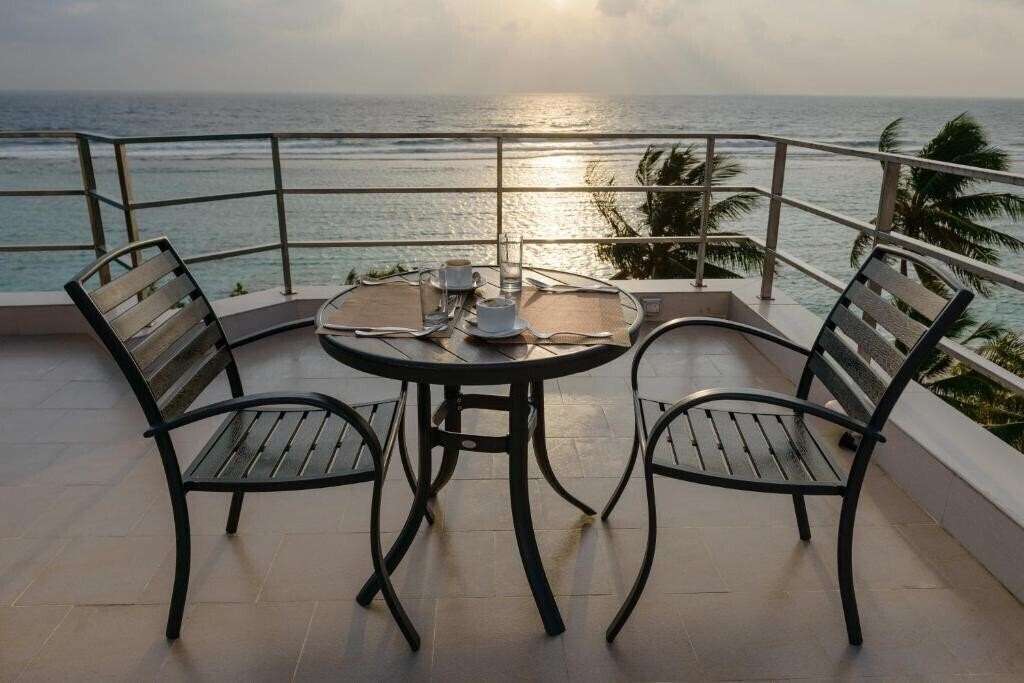 Obraz Season Holidays Hulhumale Guest House гостиный двор