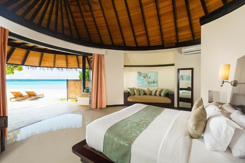 Фото The Sun Siyam Iru Fushi Beach And SPA Resort 5*