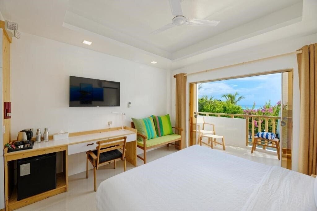 Изображение Luau Beach Inn Maldives Guest House гостиный двор