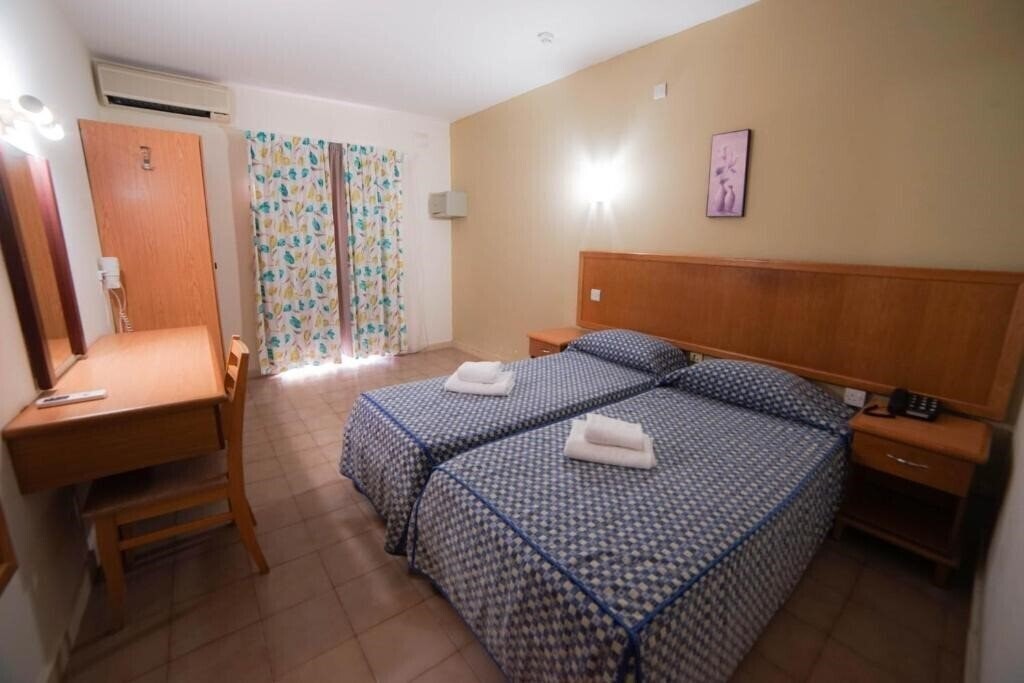 Отель Qawra Inn Hotel 4*