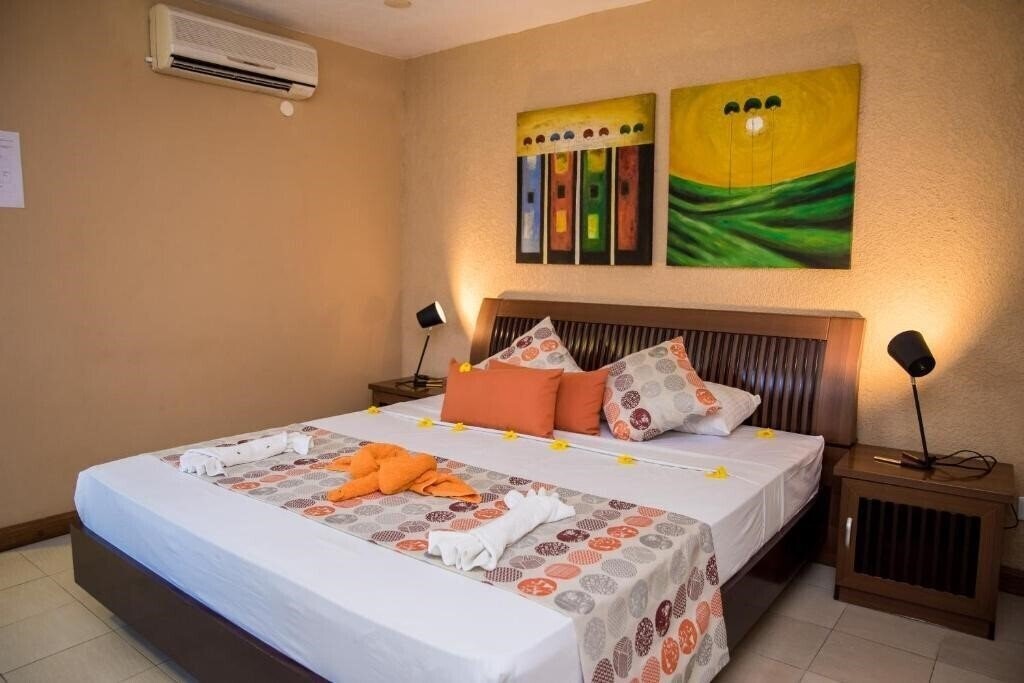 Фото La Margarita Hotel 2*