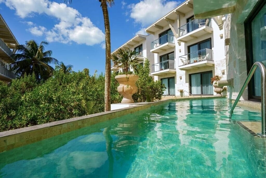 Фотографія Margaritaville St. Somewhere Punta Coco By Karisma 5*