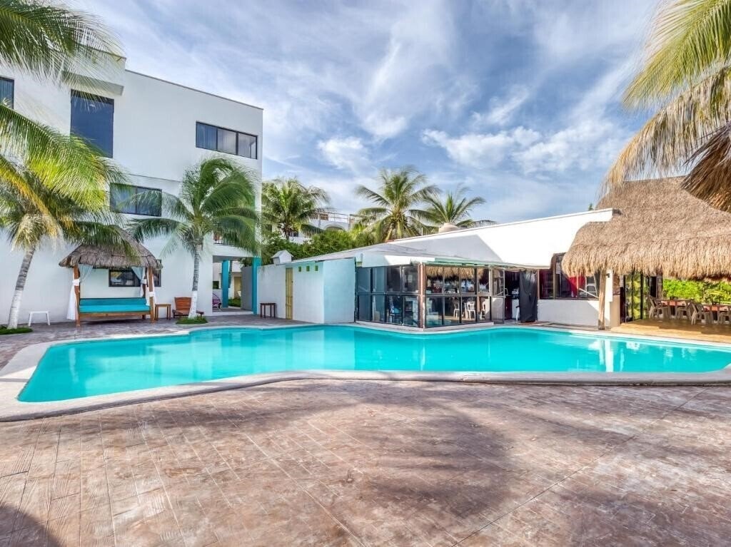 Фотографія Hotel Ojo De Agua 3*