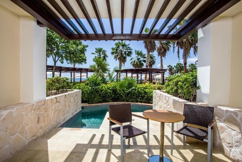 Фотография Secrets Playa Mujeres Golf & SPA Resort 5*