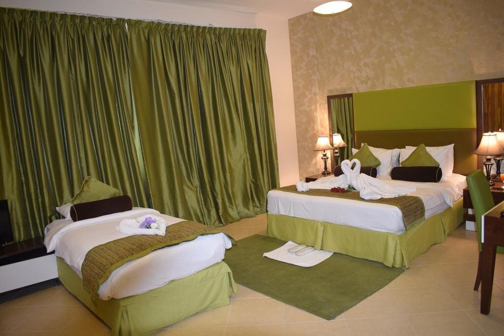 Obraz Al Waleed Holiday Homes - Al Barsha (ex. Al Waleed Palace Hotel Apartments ) 4*