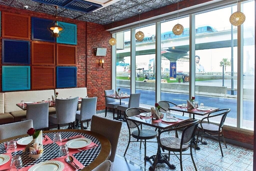 Obraz Rose Park Hotel Al Barsha 4*