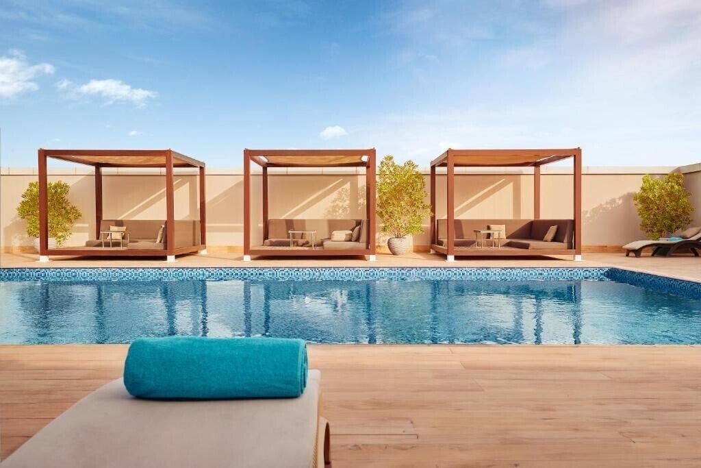 Изображение Flora Inn Hotel 4*