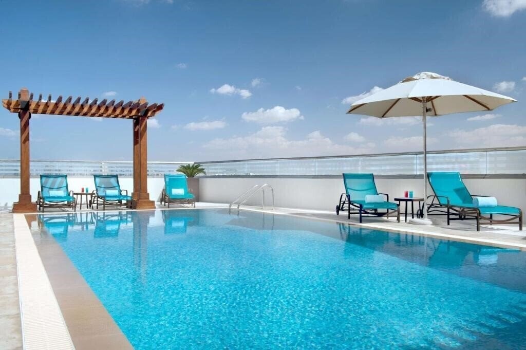 Фотография Hilton Garden Inn Dubai Al Muraqabat 4*