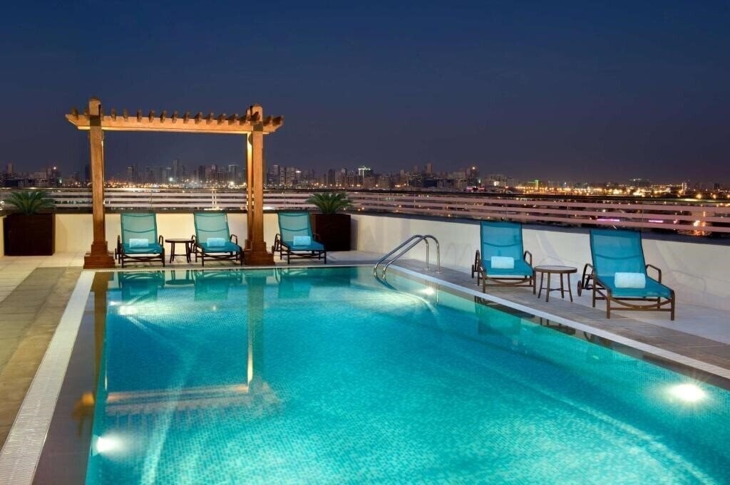 Изображение Hilton Garden Inn Dubai Al Muraqabat 4*
