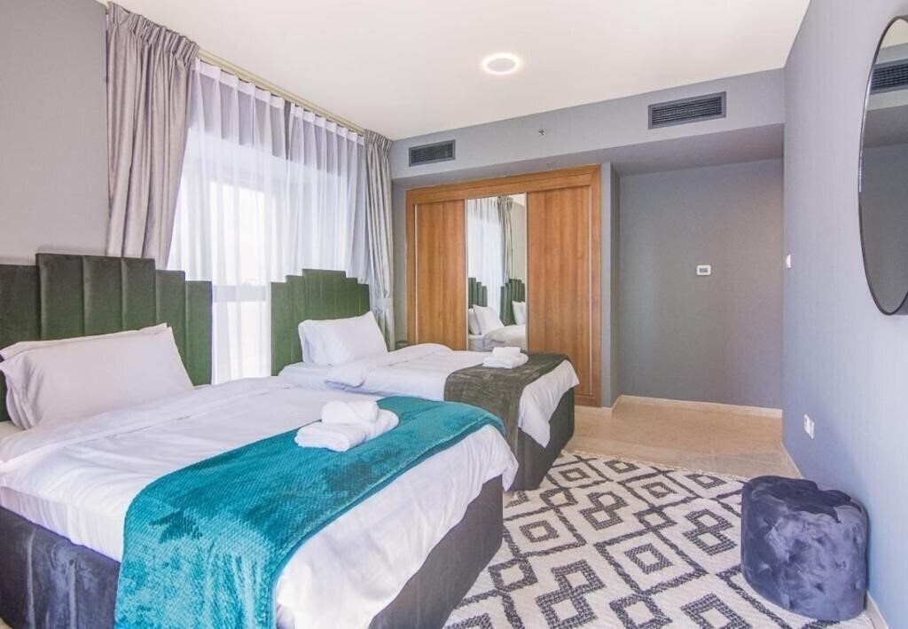 Фото Espace Holiday Homes - Princess Tower 25 Apartment апартаменты