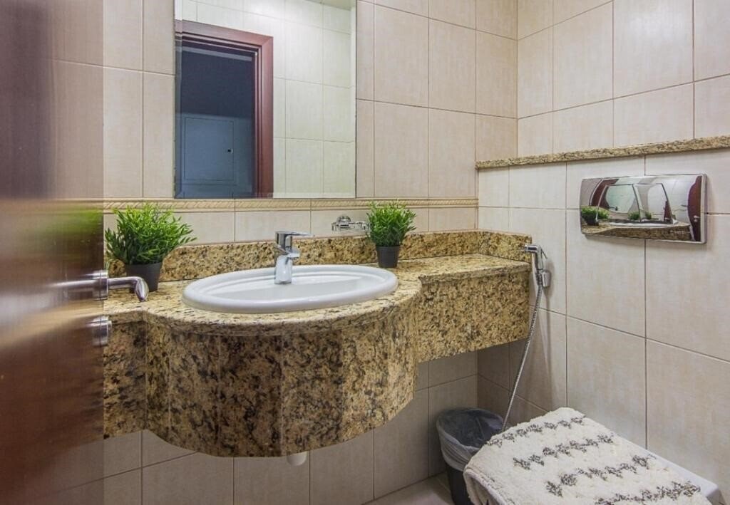 Фотография Espace Holiday Homes - Princess Tower 25 Apartment апартаменты