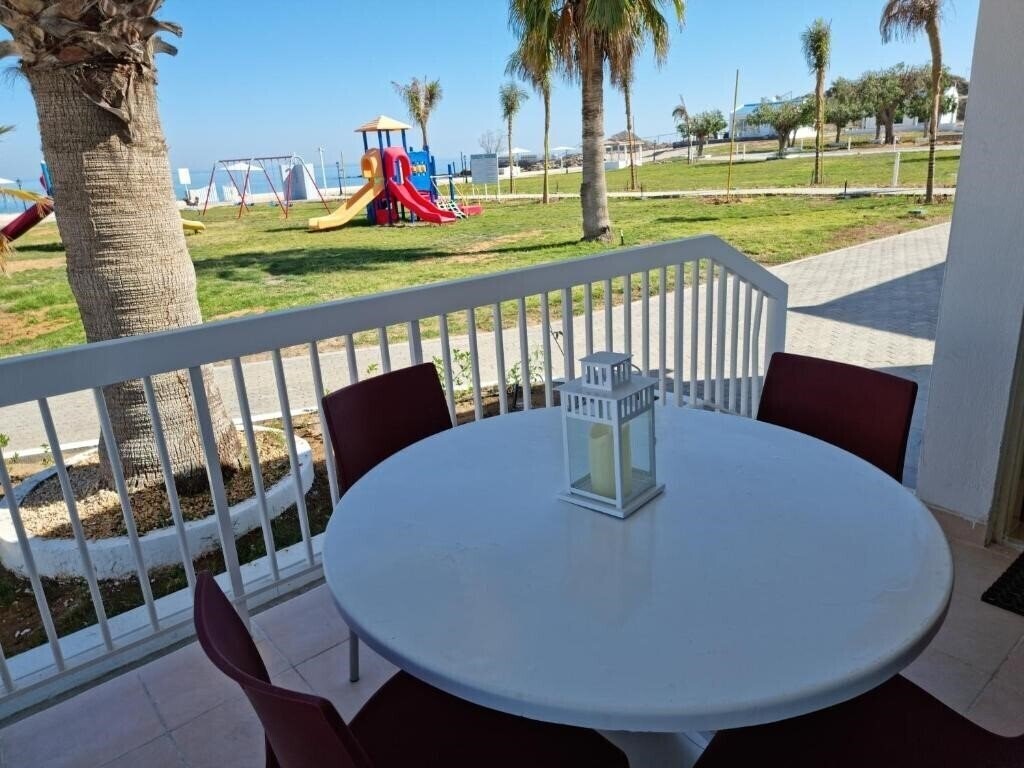 Zdjęcie Capital O 224 Holiday Beach Resort 3*