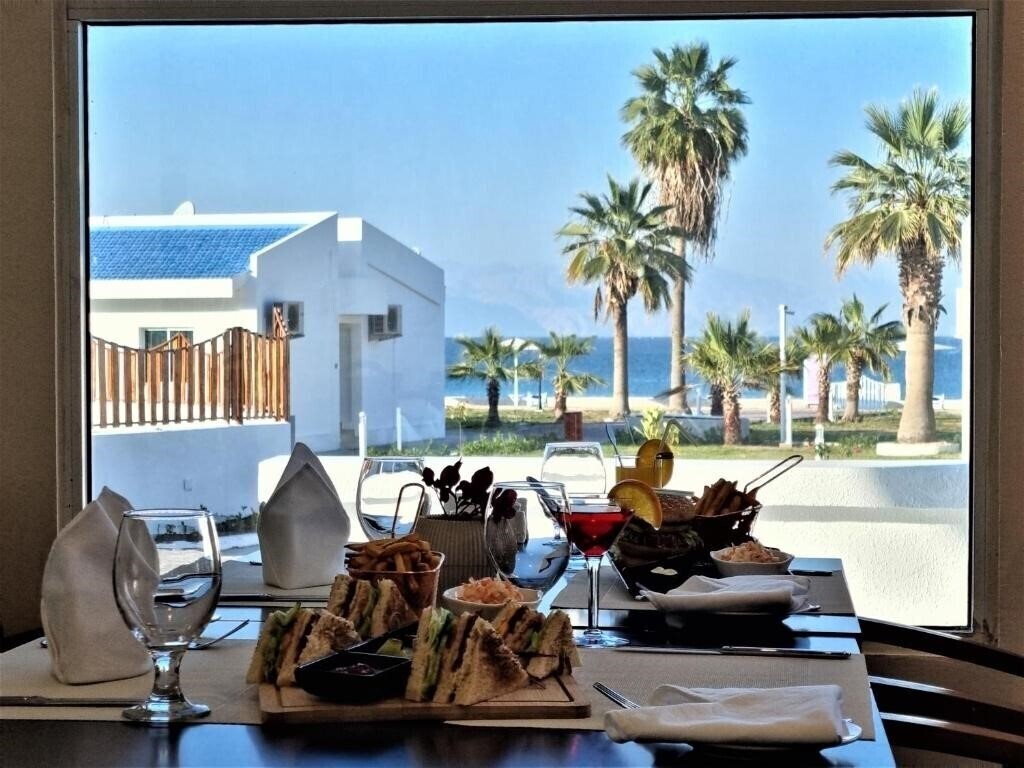 Изображение Holiday Beach Resort 4*