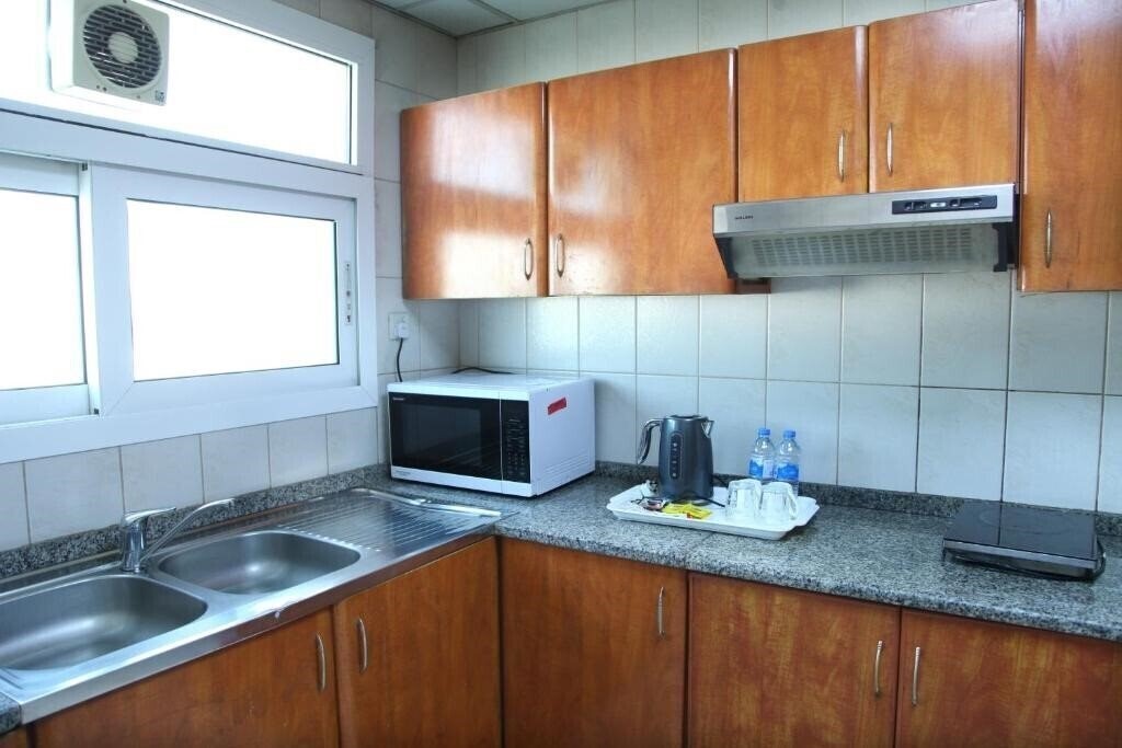 Obraz Ruwi Hotel Apartments By Oyo Rooms 3*