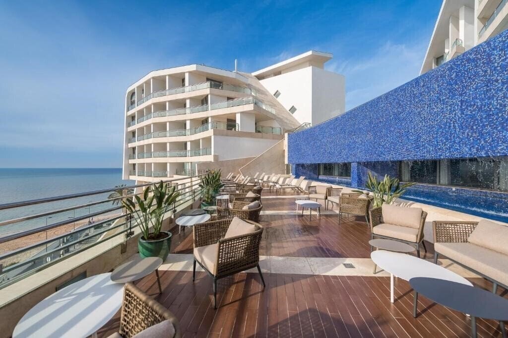 Фото Sesimbra Oceanfront Hotel 4*