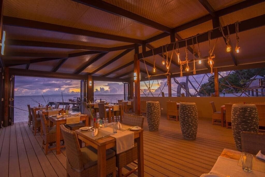 Zdjęcie Coco de Mer Hotel and Black Parrot Suites (ex. Coco De Mer) 4*