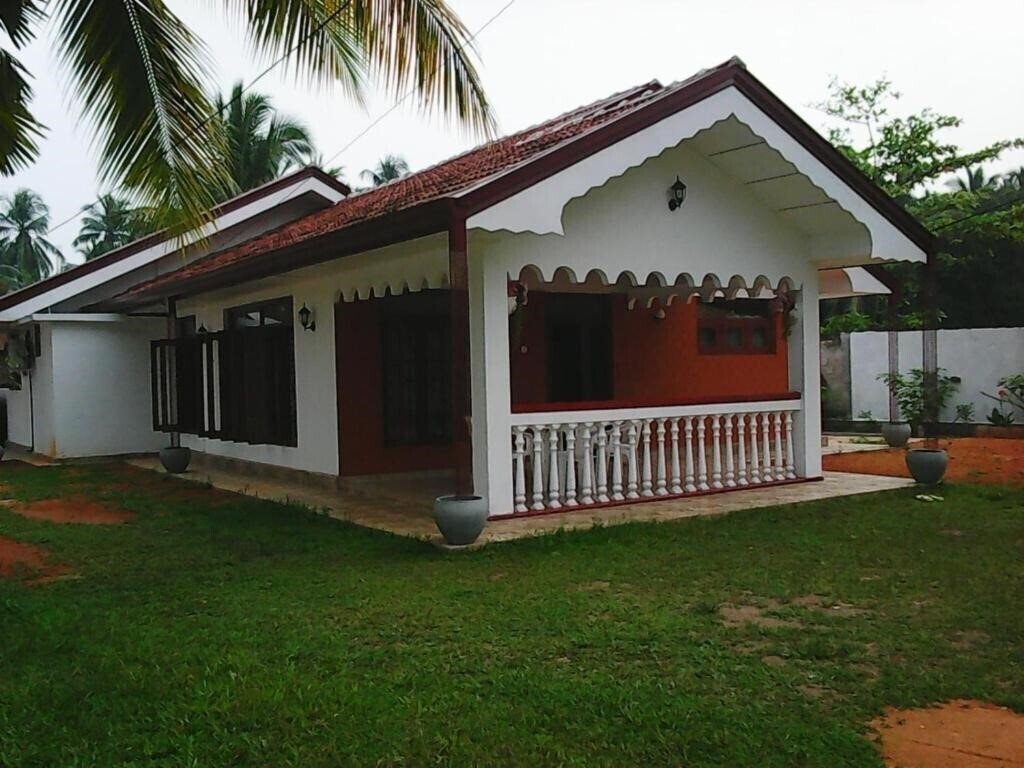 Obraz Nadee Villa Guest House гостиный двор