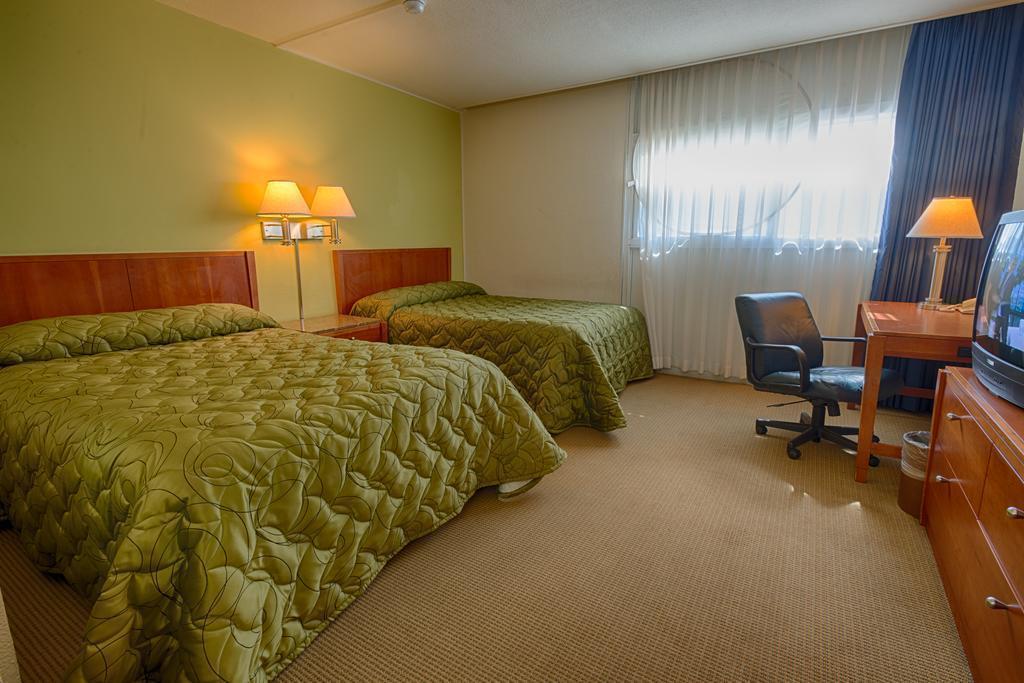 Zdjęcie Oasis Inn 2*