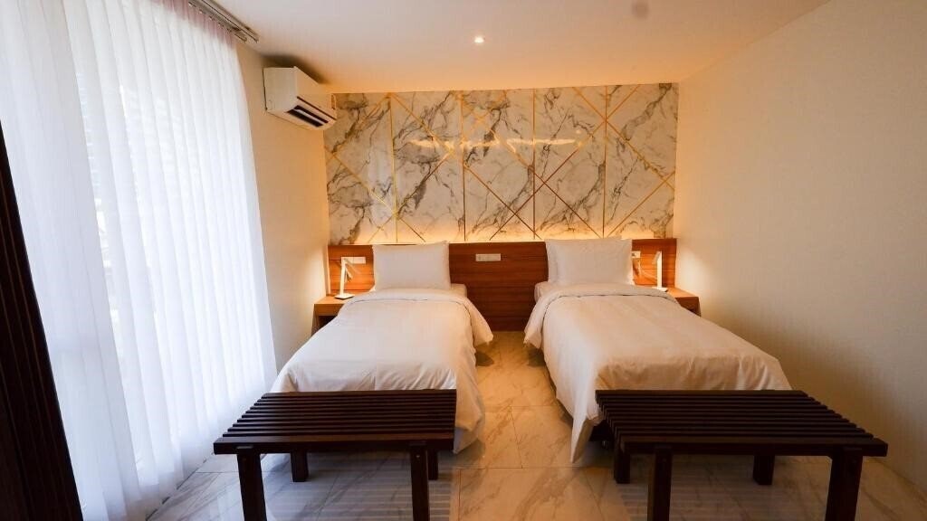 Фотографія Pinnacle Sukhumvit Inn Bangkok 3*