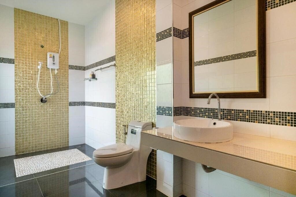 Zdjęcie Oyo 665 Sj House Hotel 3*