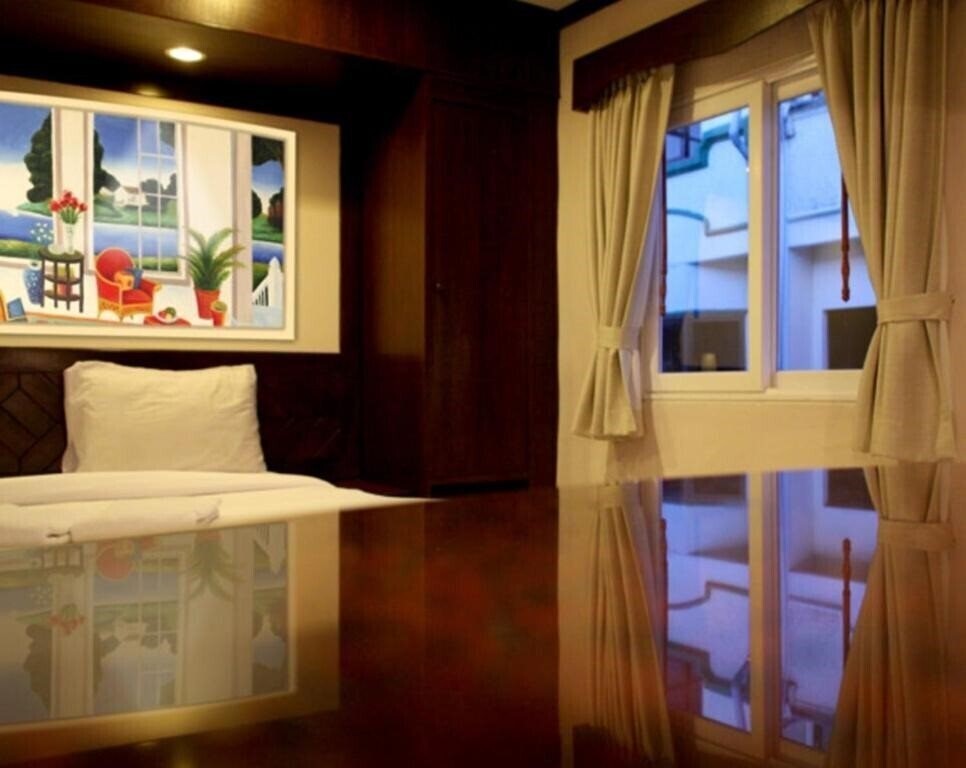 Фотографія Karon Cafe Inn 2*