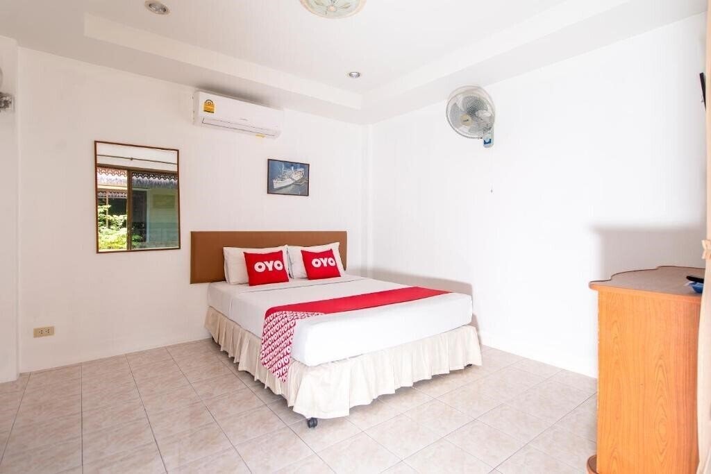 Фотографія Oyo 325 Naiyang Cottage 3*