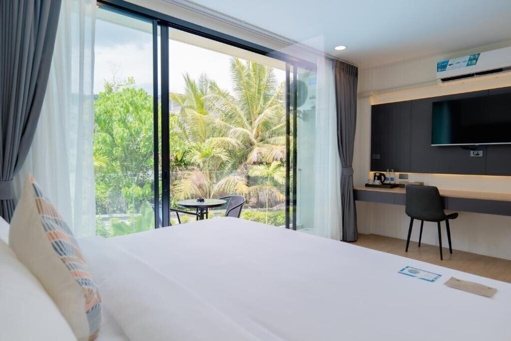 Фотография Seaside Naithon Phuket 4*