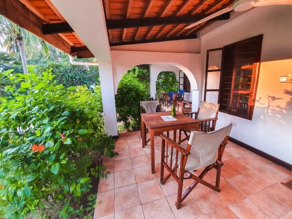 Фотографія Flame Tree Cottages 3*