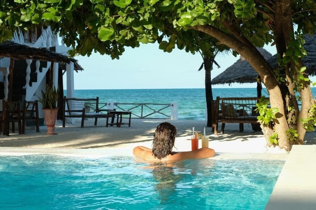 Фото Makuti Beach Bungalows 4*